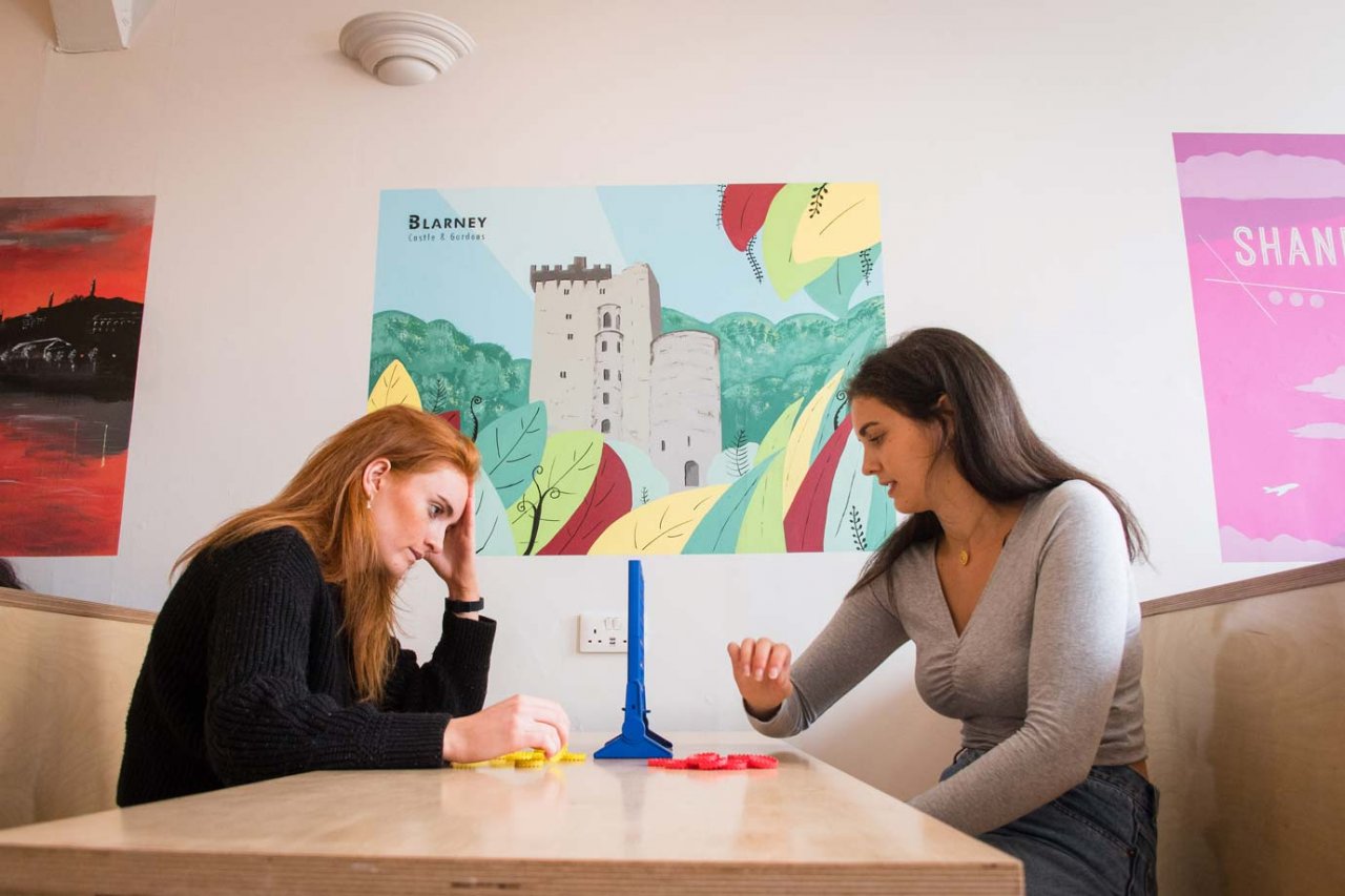 Common Area - Sheilas Hostel Cork Two Girls in Hostel Chill Out Area