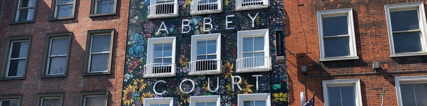 Abbey Court Hostel Front Flowery Mural-Covered Abbey Court Hostel Front