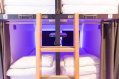 Two levels of Pods - capsule hostel in dublin. twolevels of pods with access ladder - modern hostel accommodation