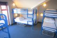 Galway Accommodation For Student Groups Three Bunk Bads in Student Hostel Room Blue Bad Frames
