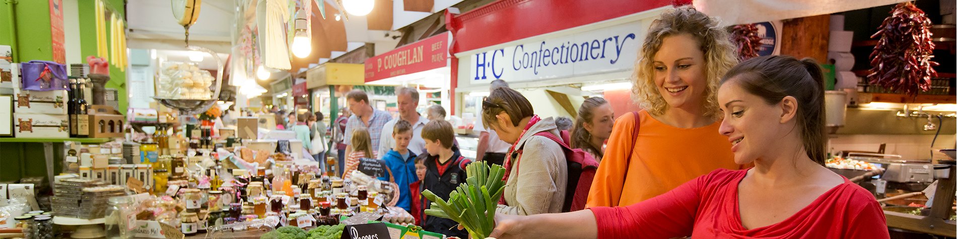 Food & Drink Attractions Ireland People shopping at the English Market in Cork, Ireland