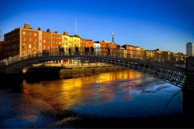 People crossing the iconic bridge in Ireland's Capital City